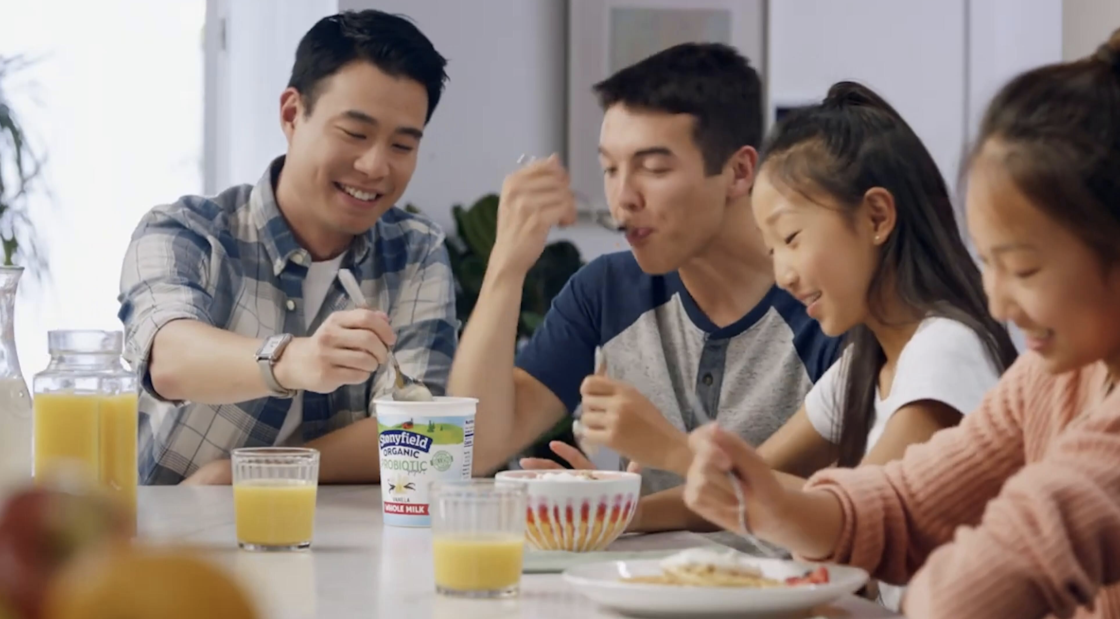 Family eating Stonyfield yogurt